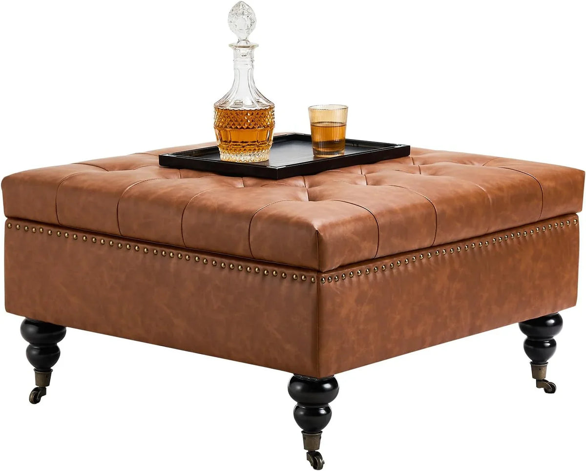Square leather footstool with storage function, coffee table-style footstool with soft padded raised buttons, equipped with wheels, polyurethane leather high-density sponge, suitable room, dormitory, bedroom, in brown color scheme.